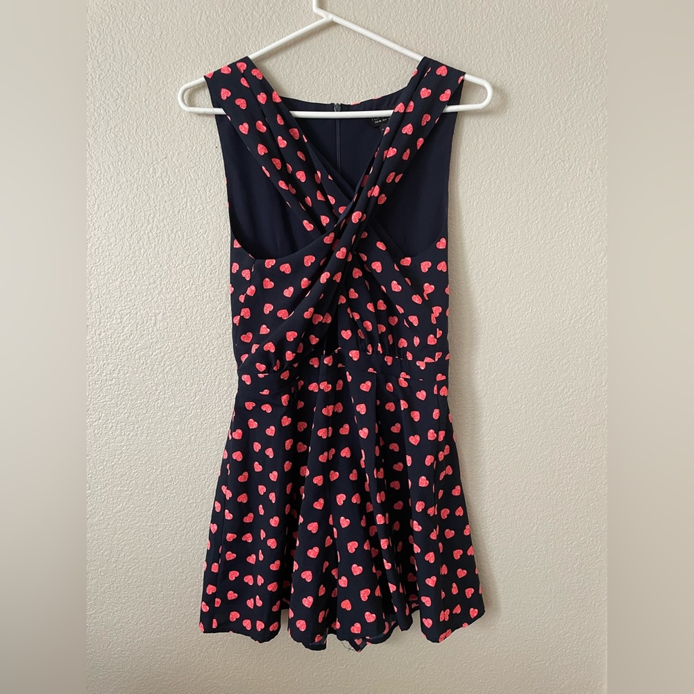 Beautiful jumpsuit, it’s blue with pink hearts💖